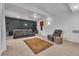 Finished basement featuring recessed lighting, neutral carpet, a large couch, and additional seating at 1385 Candleglow St, Castle Rock, CO 80109