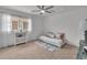 Cozy bedroom with neutral carpet, bright windows, and ample space for relaxation and personalization at 1385 Candleglow St, Castle Rock, CO 80109