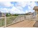 Relaxing deck showcasing picturesque views of the neighborhood and distant mountains at 1385 Candleglow St, Castle Rock, CO 80109