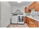 Spacious laundry room with updated washer and dryer, plenty of counter and cabinet space at 1385 Candleglow St, Castle Rock, CO 80109
