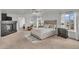 Inviting main bedroom with a fireplace, plush carpet, and an abundance of natural light for relaxation at 1385 Candleglow St, Castle Rock, CO 80109