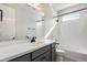 Bathroom featuring a grey vanity, neutral paint, and an alcove bathtub at 24661 E 33Rd Dr, Aurora, CO 80019