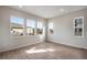 Bright bedroom featuring wood floors, recessed lighting, and multiple windows offering lots of natural light at 24661 E 33Rd Dr, Aurora, CO 80019