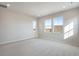 Bonus room featuring neutral carpet and multiple windows offering great natural light at 24661 E 33Rd Dr, Aurora, CO 80019