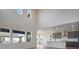 Bright, open concept living space with soaring ceilings and oversized windows for lots of natural light at 24661 E 33Rd Dr, Aurora, CO 80019