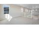 Upstairs loft area with staircase and multiple windows allowing for natural light at 24661 E 33Rd Dr, Aurora, CO 80019