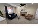 Bright living room with a fireplace, neutral tones, and a cozy seating area at 1469 S Reed St, Lakewood, CO 80232