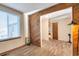 Charming dining room with decorative wood wall and ample natural light at 2707 S Richfield St, Aurora, CO 80013