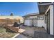 Private backyard featuring a grill, patio and decorative accents, great for outdoor entertaining at 433 S Xavier St, Denver, CO 80219
