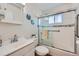 Cozy bathroom with tub and shower combination, plus a vanity with a sink at 433 S Xavier St, Denver, CO 80219