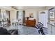 A versatile living space filled with natural light and ample space for relaxation and fitness at 433 S Xavier St, Denver, CO 80219