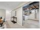 Finished basement area showing access to the laundry area at 6147 Dunraven St, Golden, CO 80403