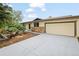 Charming single-story home with a two-car attached garage and well-maintained front yard landscaping at 6147 Dunraven St, Golden, CO 80403