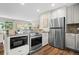Well-equipped kitchen featuring stainless steel appliances and an open layout at 6147 Dunraven St, Golden, CO 80403