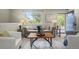 Inviting living room featuring a large window, comfortable seating, and stylish decor at 6147 Dunraven St, Golden, CO 80403