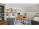Open-concept living space that connects to the kitchen and dining area at 6147 Dunraven St, Golden, CO 80403