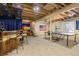 Finished basement area with a wet bar, game table, and an American flag on the wall at 556 Rachael Pl, Castle Pines, CO 80108