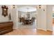 Spacious dining room with hardwood floors, chandelier, and traditional furniture at 556 Rachael Pl, Castle Pines, CO 80108