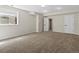 Neutral carpeted bedroom with a window and closet at 8425 Green Island Cir, Lone Tree, CO 80124