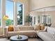 Bright living room with comfortable seating, large windows, and an open floor plan at 8425 Green Island Cir, Lone Tree, CO 80124