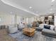 Spacious open concept living room with plush seating and modern decor at 8425 Green Island Cir, Lone Tree, CO 80124