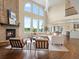 Spacious living room with fireplace, large windows, and comfortable seating at 8425 Green Island Cir, Lone Tree, CO 80124