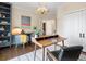 Another view of this home office with custom desk and hardwood floors at 8425 Green Island Cir, Lone Tree, CO 80124