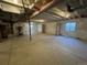 Unfinished basement space offering ample storage and potential for future development at 5581 Wisteria Ave, Firestone, CO 80504