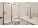 Bathroom with a shower/tub combo, white vanity, and marble flooring at 5581 Wisteria Ave, Firestone, CO 80504