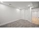 Bedroom with neutral carpet, double closet and doorway to another room at 2341 Poze Blvd, Thornton, CO 80229