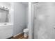 Bathroom featuring shower with glass door, mirror, and a vanity sink at 1155 S Fairplay Cir # D, Aurora, CO 80012