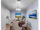 A well lit dining room featuring new hardwood floors and lovely decorations at 1155 S Fairplay Cir # D, Aurora, CO 80012