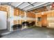 Interior view of garage with concrete flooring and interior door to unit at 1155 S Fairplay Cir # D, Aurora, CO 80012