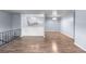 Spacious living room with hardwood floors adjacent to kitchen and dining areas at 1155 S Fairplay Cir # D, Aurora, CO 80012