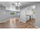A combined living and dining space with an open floor plan and hardwood floors at 1155 S Fairplay Cir # D, Aurora, CO 80012