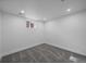 Unfurnished basement with carpet, white walls and trim, and a small window at 3315 N Josephine St, Denver, CO 80205