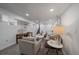 Finished basement living area with carpet, recessed lighting, and comfortable seating at 3315 N Josephine St, Denver, CO 80205