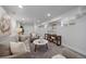 Finished basement living area with carpet, recessed lighting, and comfortable seating at 3315 N Josephine St, Denver, CO 80205