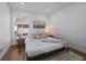 Bright bedroom featuring neutral tones, soft bedding, and great natural light at 3315 N Josephine St, Denver, CO 80205