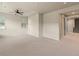 Spacious bedroom with large windows and neutral carpeting at 8983 E Nichols Pl, Centennial, CO 80112
