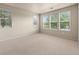Bright, spacious bedroom with large windows offering ample natural light at 8983 E Nichols Pl, Centennial, CO 80112