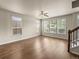 Spacious living room with hardwood floors, and an abundance of natural light at 8983 E Nichols Pl, Centennial, CO 80112