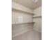 Walk-in closet with multiple shelves for organized storage at 8983 E Nichols Pl, Centennial, CO 80112