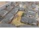 Overhead view of the community showcasing the layout of homes, green spaces, and neighborhood streets at 3000 E 112Th Ave # 102, Northglenn, CO 80233