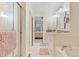 Bright bathroom features a soaking tub and glass shower at 3000 E 112Th Ave # 102, Northglenn, CO 80233