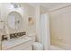 Well-maintained bathroom featuring a shower-tub combo and decorative backsplash at 3000 E 112Th Ave # 102, Northglenn, CO 80233