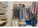 Organized walk-in closet with shelving and ample storage space at 3000 E 112Th Ave # 102, Northglenn, CO 80233