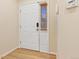 Entryway featuring a secure white door and coordinated trim at 3000 E 112Th Ave # 102, Northglenn, CO 80233