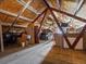 Spacious attic area with plywood walls and ceiling offering ample storage and potential for customization at 8387 N Sunburst Trl, Parker, CO 80134