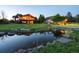 Spacious backyard with a pond, putting green, and charming home at 8387 N Sunburst Trl, Parker, CO 80134